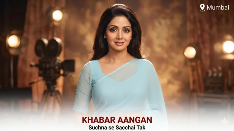 Woman in blue saree, studio backdrop.